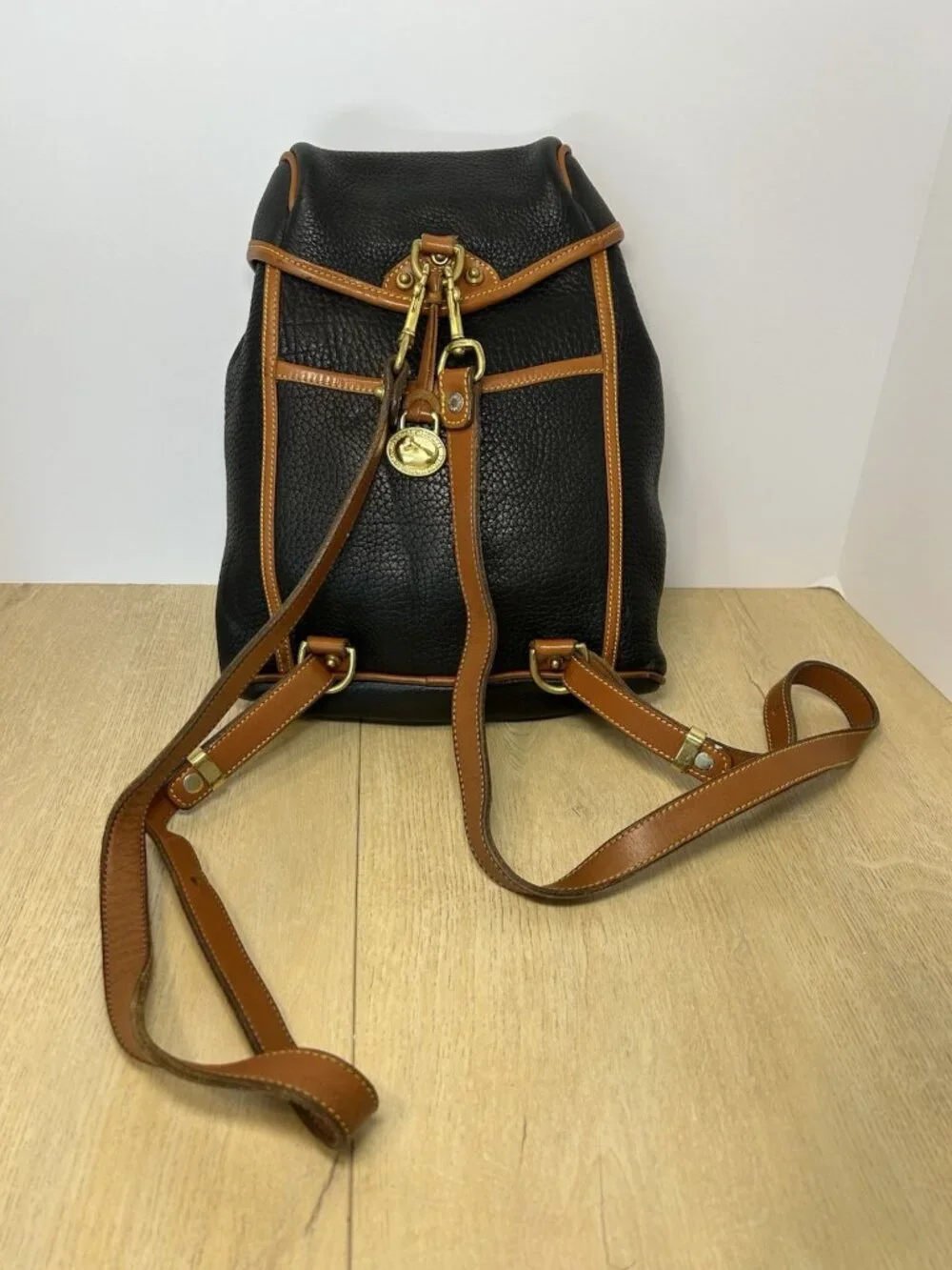 Vintage Dooney & Bourke Black Tan Color All Weather Leather Backpack